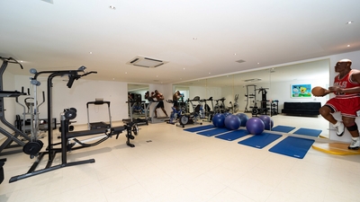 Fitness Room: In the basement. Large air conditioned fitness room equipped with a bicycle, elliptic,
