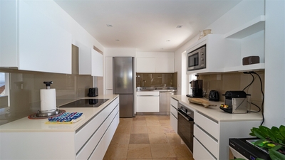 Kitchen & Outdoor Dining Areas: Air-conditioned, fully equipped kitchen, electric oven, induction co