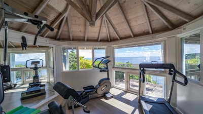 Fitness Room: Air-conditioned, equipped with a treadmill, an elliptical machine and a multi-function