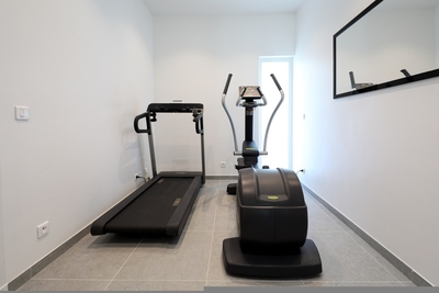 Fitness Room: Treadmill, Elliptic, and different weights, Air conditioning