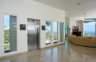 Easily move your luggage with the help of the elevator located near the living area