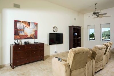 Relax in one of the several recliners while you watch a bit of TV in Villa del Mar