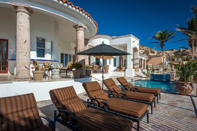 Relax and soak up some of the warm Cabo sun on one of the many lounge chairs found along the terrace