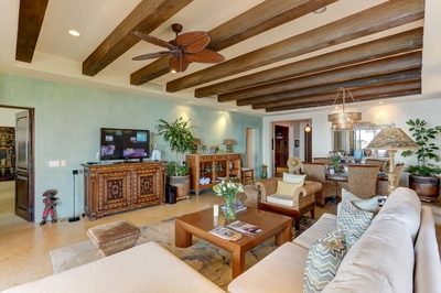 The open concept plan of Hacienda Tranquila's living and dining area make entertaining guests much e