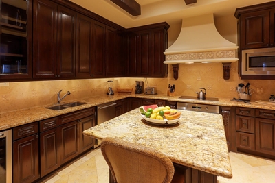 Granite counter tops complete the clean and professional look of the kitchen.