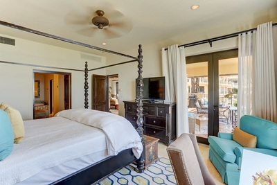 Complete with a TV and French doors that open out to the terrace, the Master Bedroom is another trea