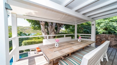 Outdoor Dining Area: Outdoor dining table on the covered terrace. 
