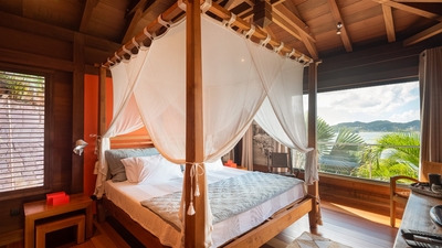 Bedroom 2: King size canopy bed, mosquito nets, programmable safe, air conditioning, wooden floor, H