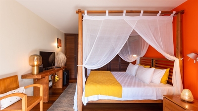 Bedroom 3: Located on the lower level. King size canopy bed, mosquito nets, programmable safe, 