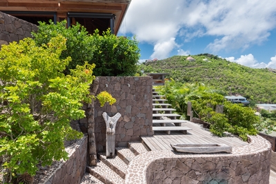 Outdoors: Tropical and lush garden, and dramatic ocean views from every parts of the property