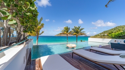 Pool & Terrace: Large heated pool facing the view over the ocean. Expansive terrace, with deckc