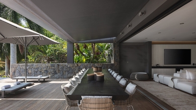 Dining Areas: Indoor and outdoor dining areas for up to 18 guests. 
