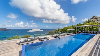 Pool & Terrace: Large heated pool facing the view over the ocean. Expansive terrace, with deckc