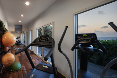 Fitness Room: On the lower level. Air-conditioned fitness room features a treadmill, an elliptic, so