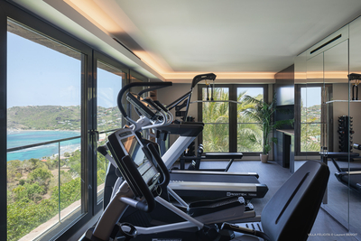 Fitness Room: Air conditioning, treadmill, sports accessories, including weight benches, weights and