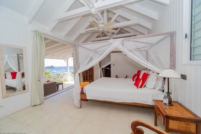 Habitation Saint Louis | Bedroom 1 with king bed, ocean view, HDTV, air conditioning and dressing ro