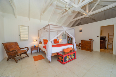 Petit Saint Louis | Bedroom 5 with ocean view, HDTV, dressing room and safe.