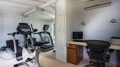 Fitness Room: Air conditioned room with fitness area equipped with treadmill and bicycle, office are