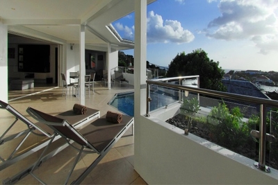 Pool & Terrace: Small infinity pool with steps, Splendid sunset views facing the Gustavia harbor and