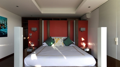 Bedroom 3: Located on the lower level, with ocean view. A king size bed, air conditio