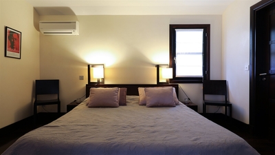 Bedroom 5: In a separate building with bedroom 4, on the back of the property. Queen size bed, 