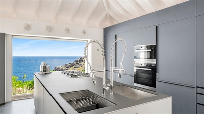 Kitchens: Two state of the art kitchens by Valcucine, renowned for its high technology and environme